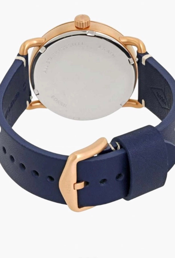 Fossil Commuter case back and navy blue strap buckle
