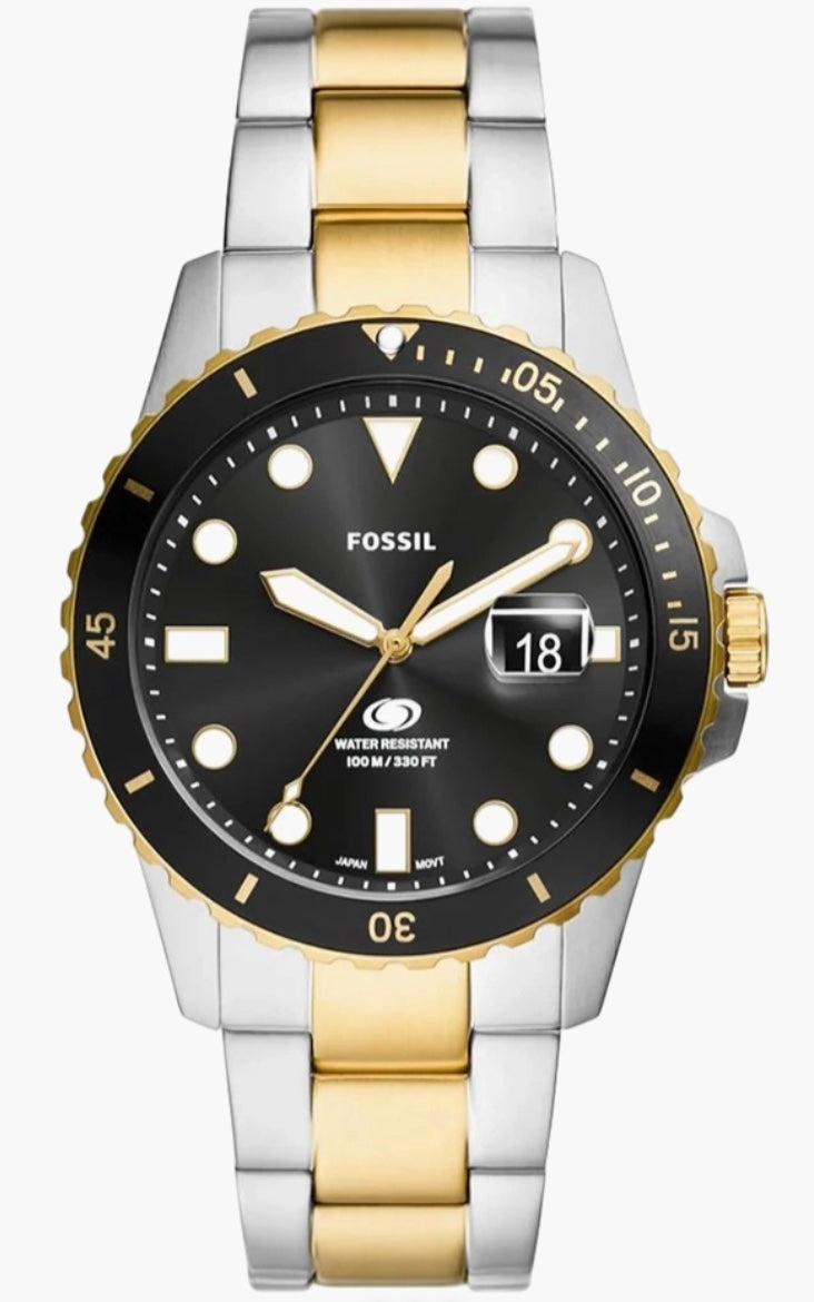 Fossil Blue two-tone diver watch side view — gold-tone bezel and crown detail