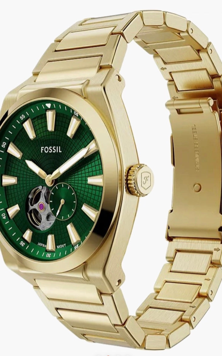 Fossil Everett Automatic side view — gold-tone crown with engraved F shield